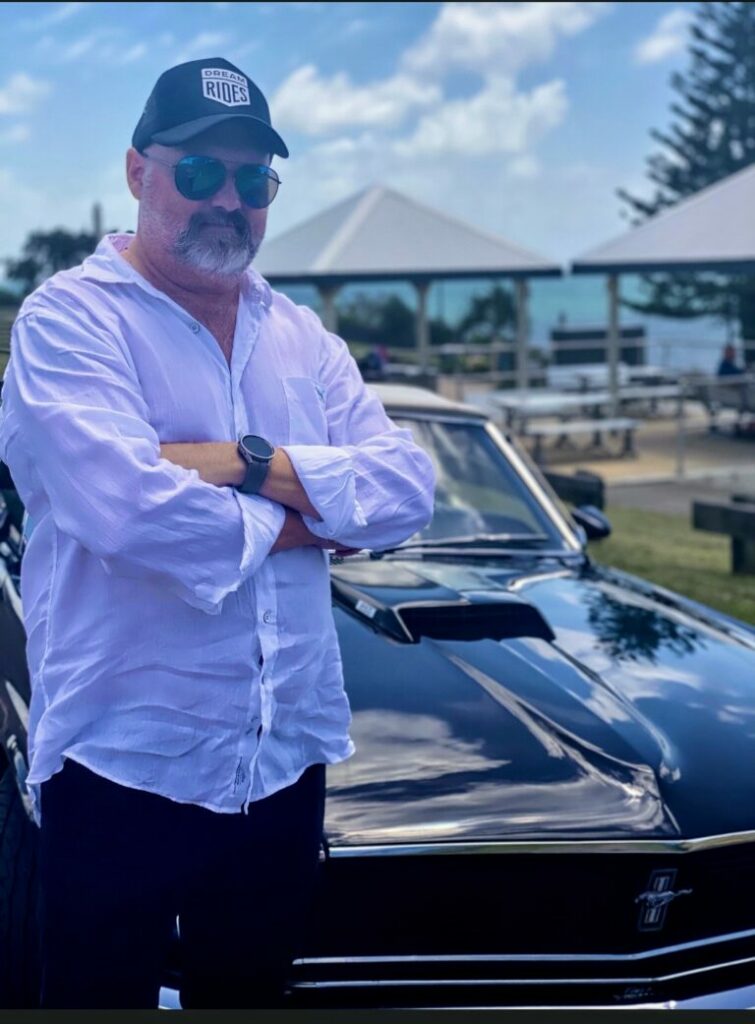 Paul owner of 1970 dark blue Ford Mustang Covertible